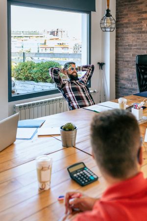 Happy office worker because he goes on vacation