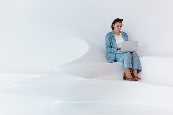 Woman browsing on laptop