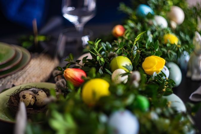 Close up of eggs nestled in lush centerpiece on Easter table