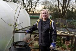 Older woman gardening outside