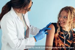 Woman getting vaccinated 5aAoA5