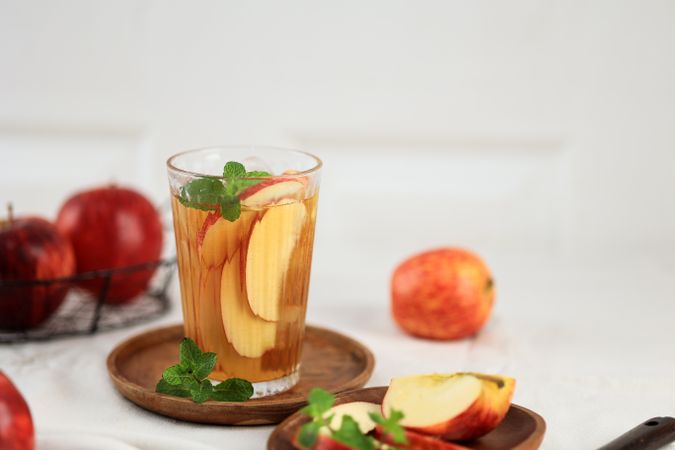 Apple Tea Cider with on Wooden Table, Copy Space for Text.