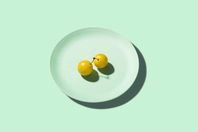 Fresh Yellow plum mirabelle fruit in plate