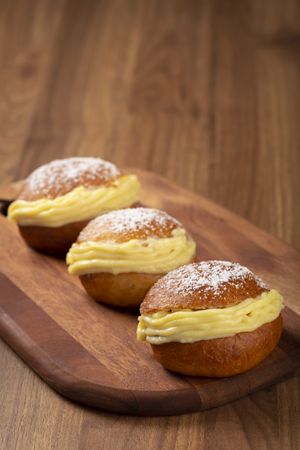 Berlin balls. Bread stuffed with icing cream.