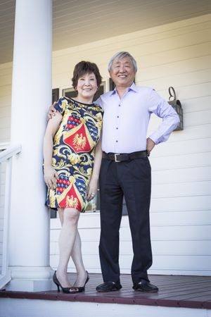 Proud Chinese Couple Enjoying Their House