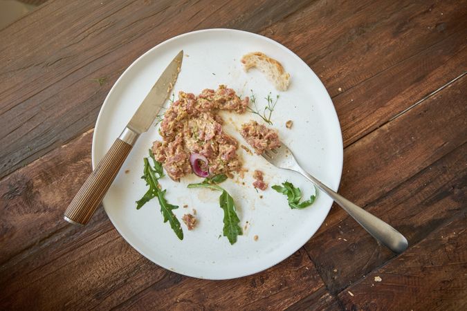 Steak tartare leftovers on plate