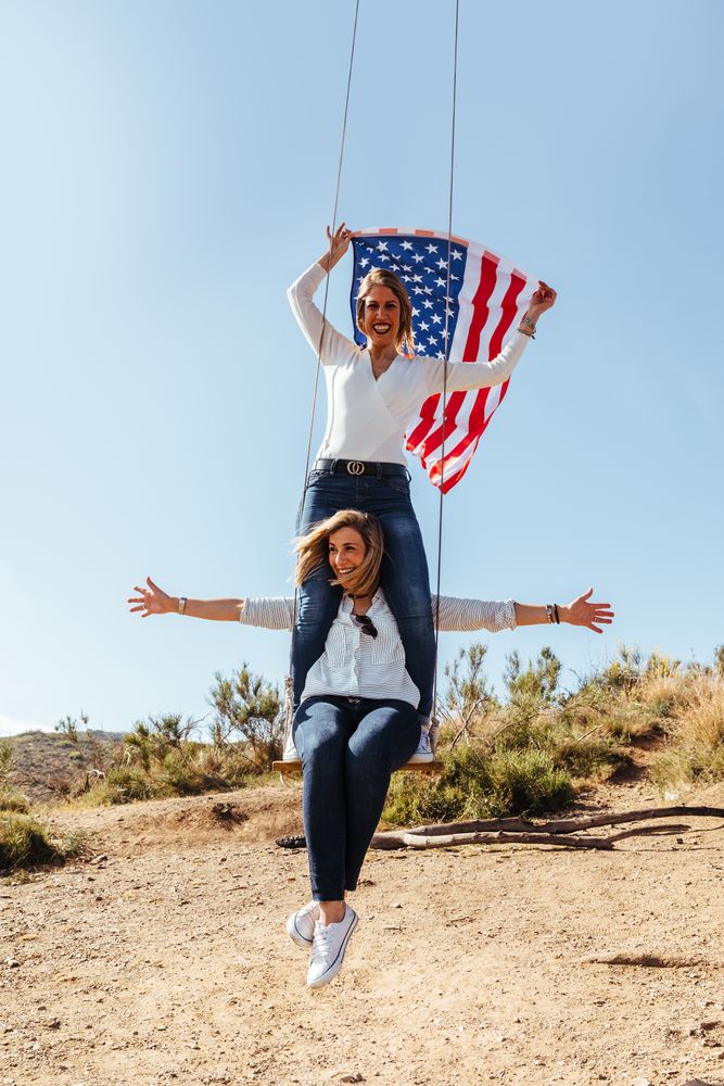 Two women with an American flag