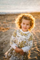 portrait of cute little girl at beach