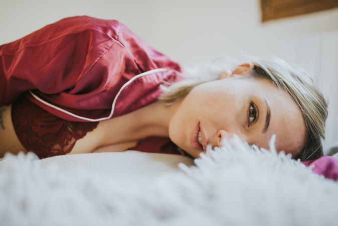 Woman and smiling in bed