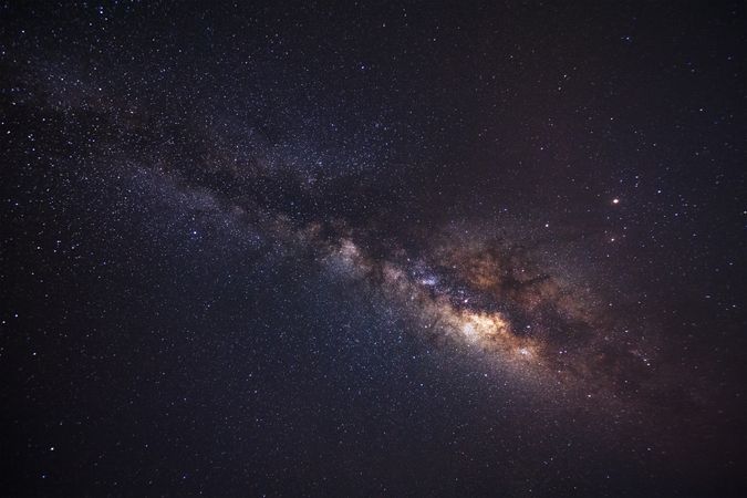 milky way galaxy and space dust in the universe, Long exposure photograph, with grain.