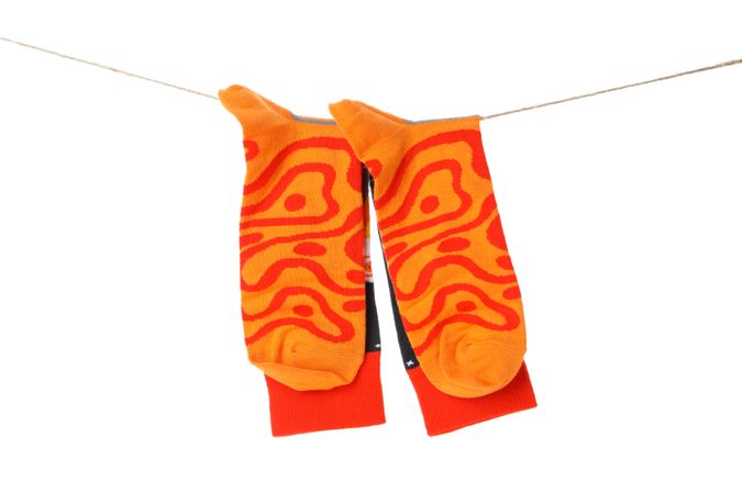 Concept of clothes for legs - socks, isolated on light background
