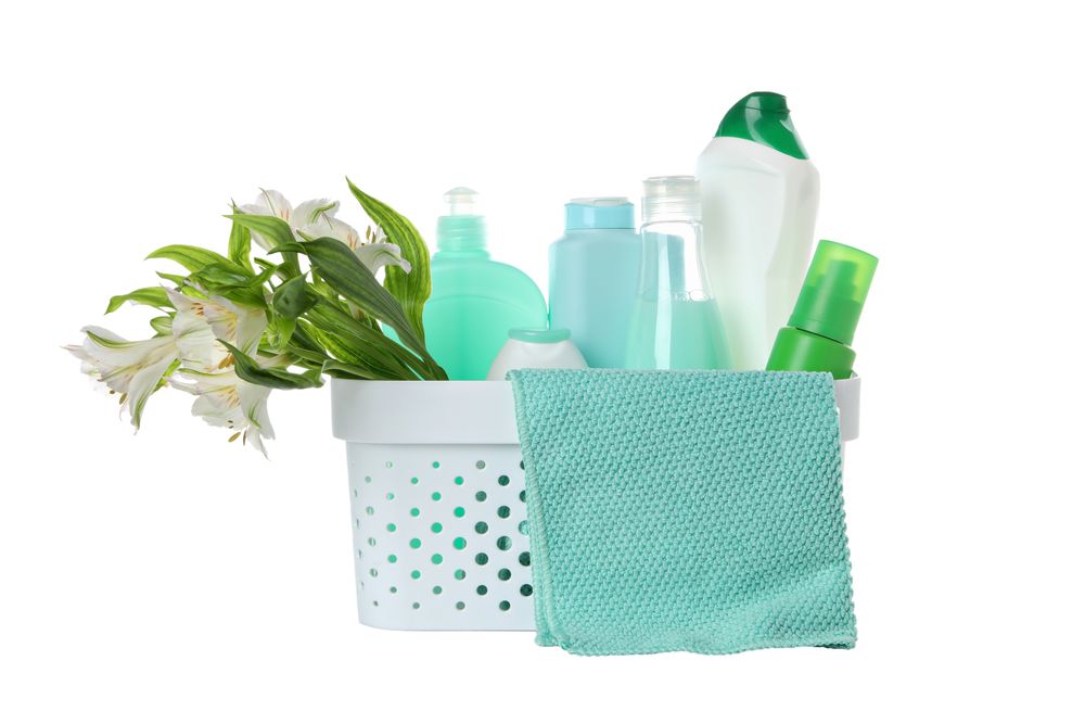Detergents in a basket, isolated on plain background