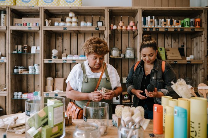 Mother and daughter in soap shop
