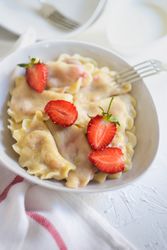 Bowl of Ukrainian strawberry dumplings