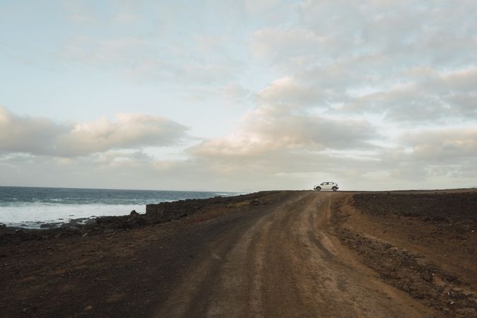 Car on road near sea