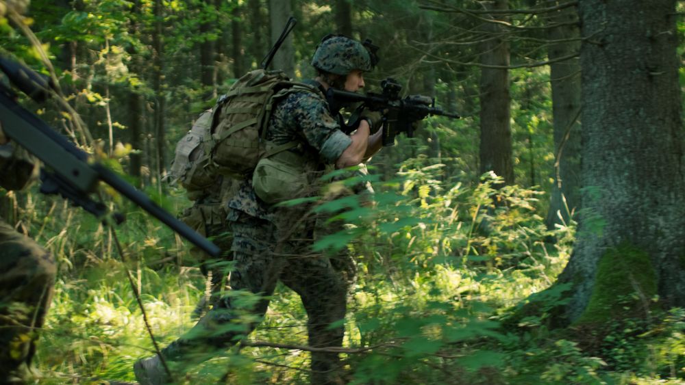 Fully Equipped Soldiers Wearing Camouflage Uniform Attacking Enemy