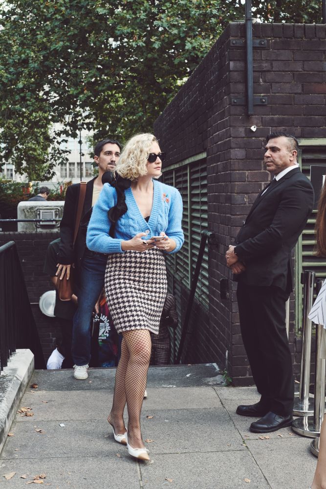 London, England, United Kingdom - September 18 2021: Stylish woman emerging from underground station