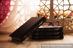 Stack of books by Iranian author 5r11Z0