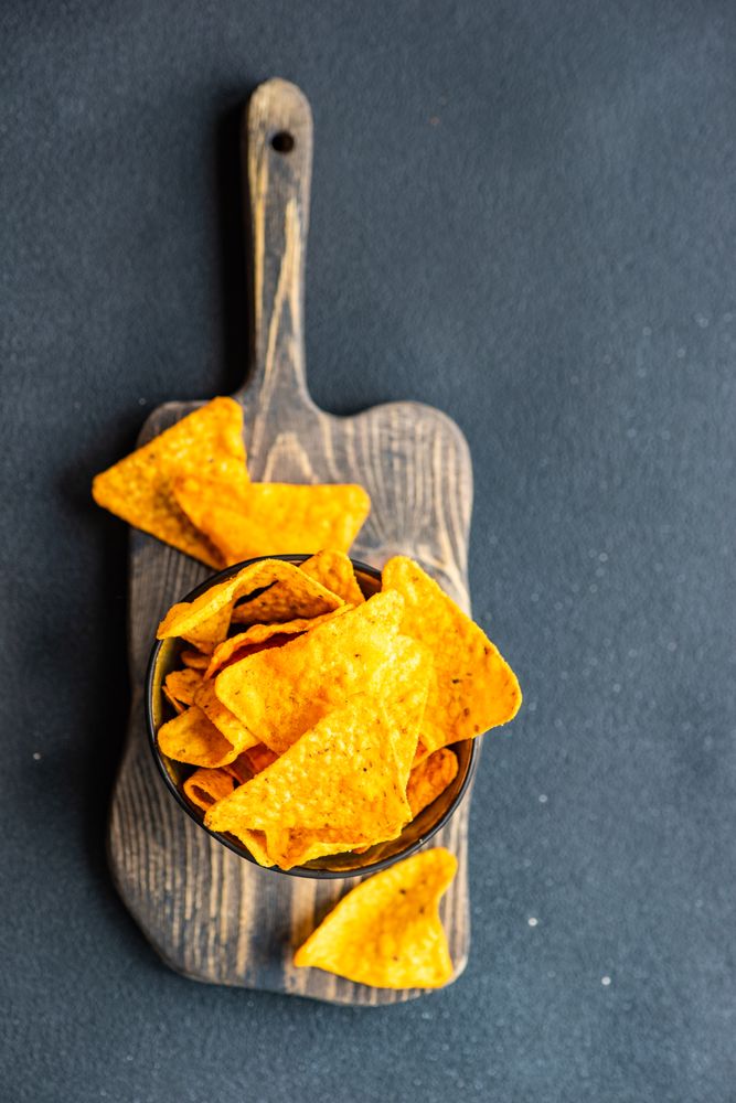 Looking down at nacho chips in bowl
