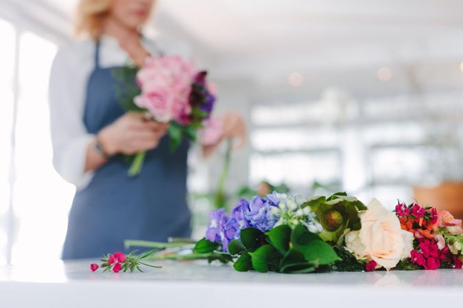 Focus on colorful and fresh flower on florist table