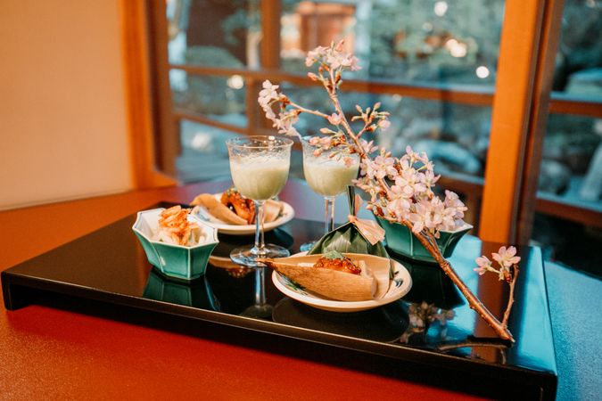 Food and drinks for two on a tray