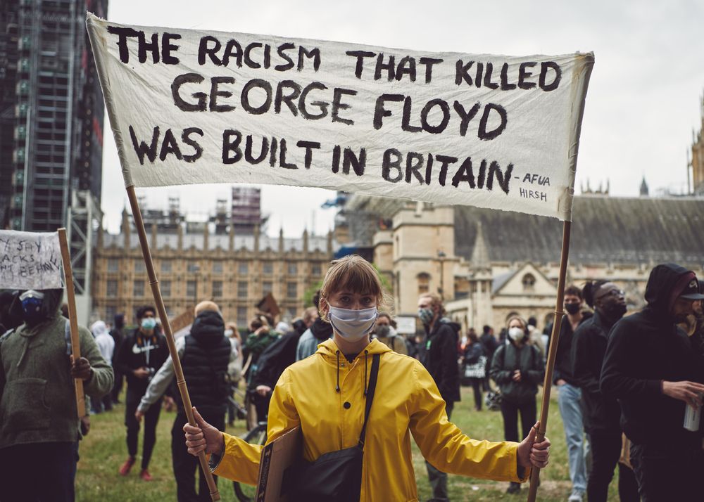 London, England, United Kingdom - June 6th, 2020: Woman holding sign at BLM protest in Westminster