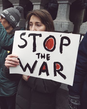 London, England, United Kingdom - March 5 2022: Woman with “Stop the War” sign
