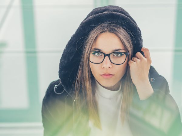 Young woman over a glasses ground