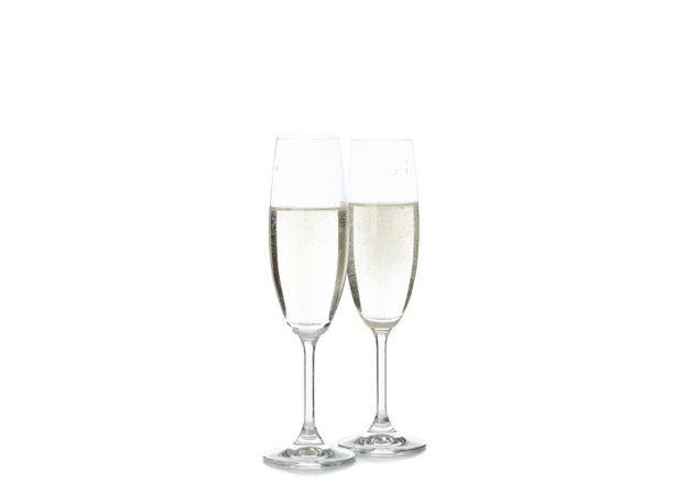 Champagne glasses isolated on light background. Celebration drink
