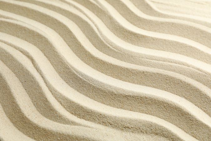 Seamless sand on a whole background, space for text. Summer vacation backdrop