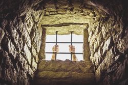 Prison window with metal bars