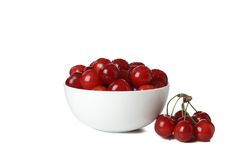 Bowl with fresh red cherry isolated on plain background