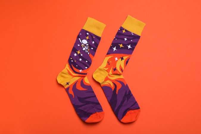 Casual clothes and wearing concept - socks, clothes for foot
