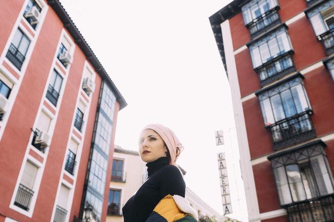 Young woman posing with cancer bandana