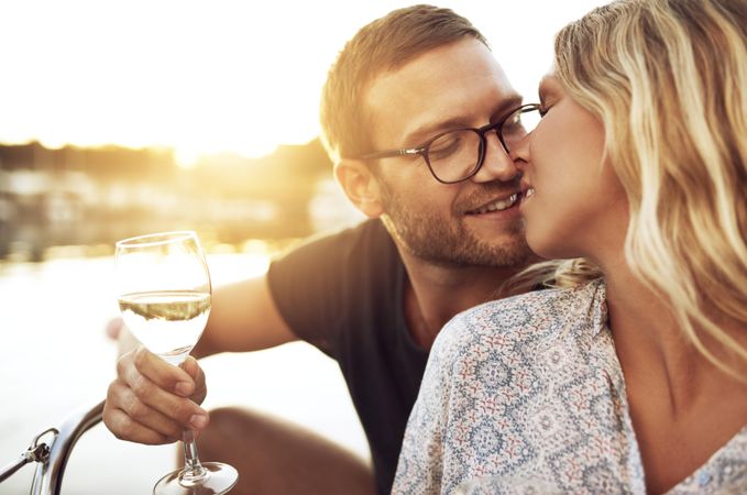 Couple smiling at each other about to kiss