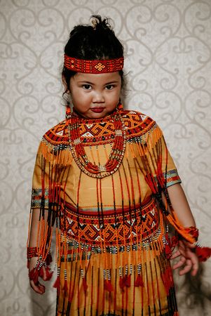 Girl wearing traditional Torajan dress from Indonesia