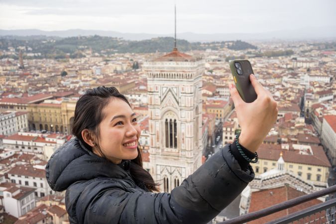 Tourist taking selfie at ancient city