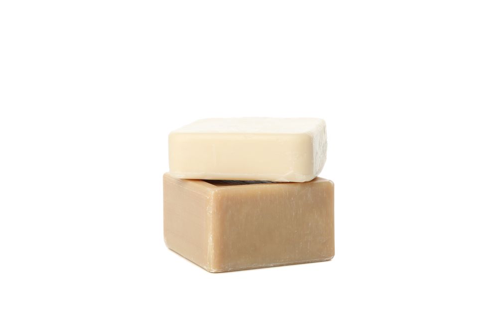 Different soap isolated on light background. Hygiene