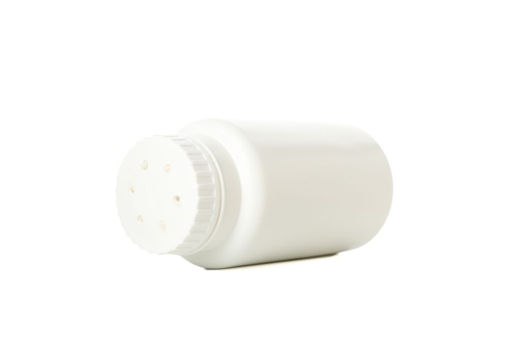 Blank bottle of talcum powder isolated on blank background