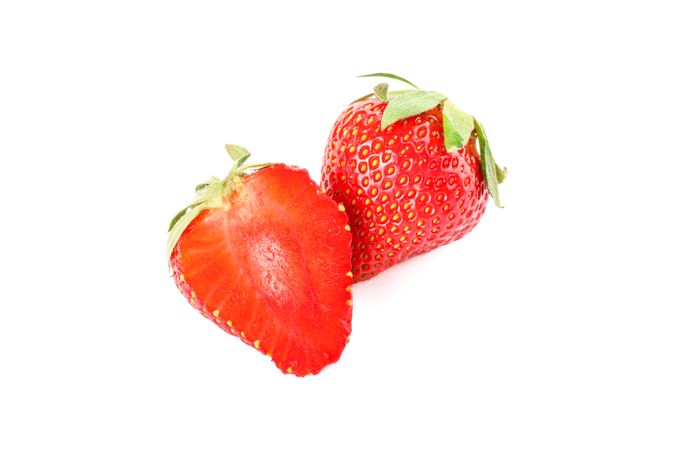 Strawberries isolated on light background. Summer sweet fruits and berries