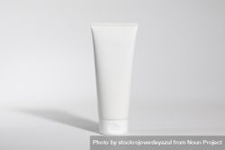 Mockup of plastic tube of cream on plain background 0yXXJO