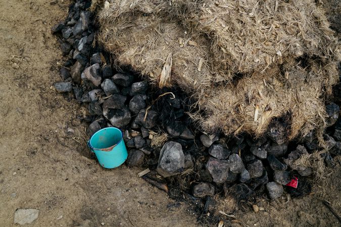 Pile of coal covered with pressed mulch