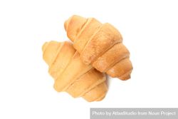 Looking down at two croissants isolated on plain background 5wJvL0