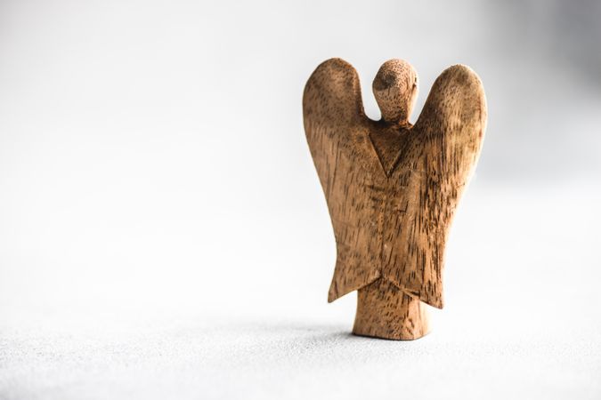 Wooden angel shaped ornament