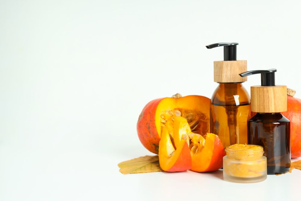 Concept of different cosmetic products, Pumpkin cosmetics, space for text