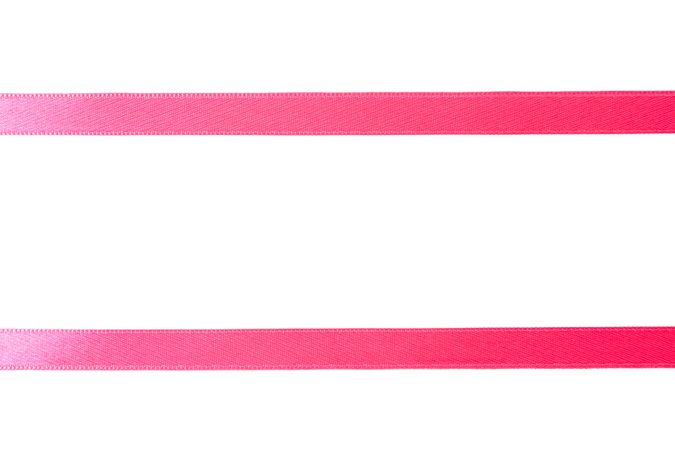 Pink ribbons isolated on plain background. Gift concept