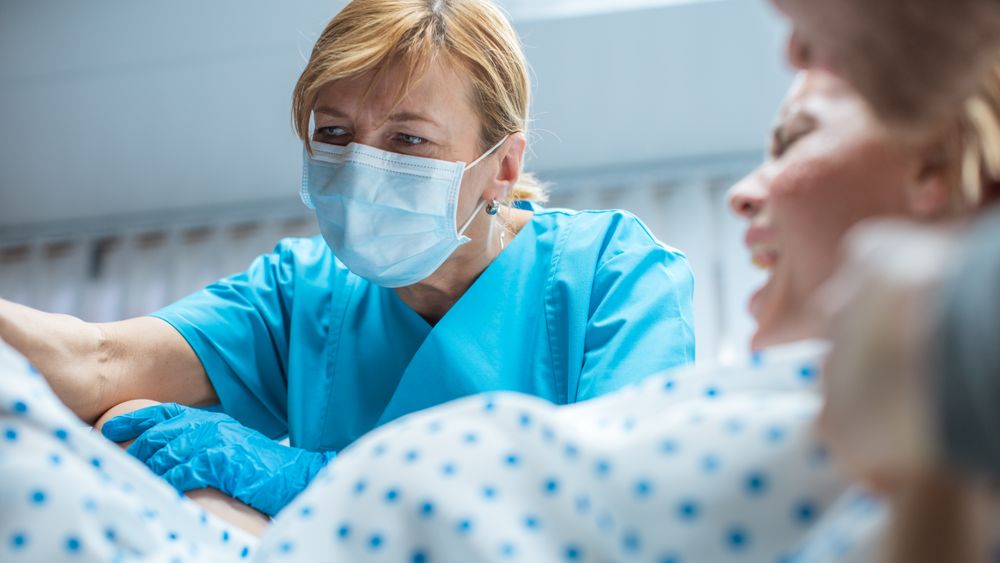 In the Hospital Close-up Shot of Professional Midwife