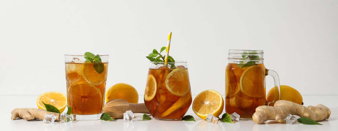 Cold tea with fresh oranges and mint leaves