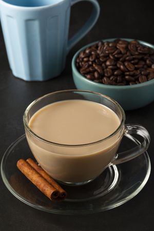 Cup of coffee with creamy milk.