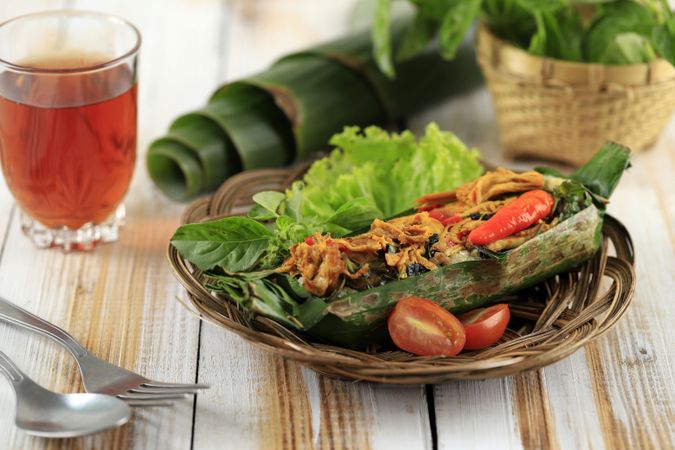 Nasi bakar ayam suwir kemangi, steamed rice with stir fry spicy shredded chicken